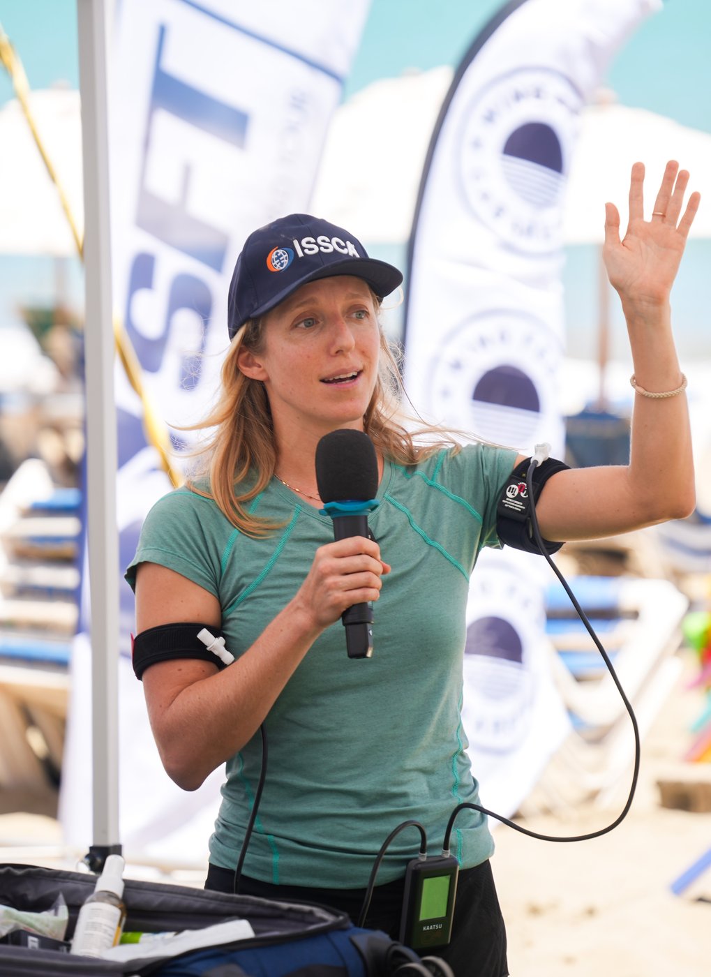Dasha Maximov speaking at a Cabarete community event.